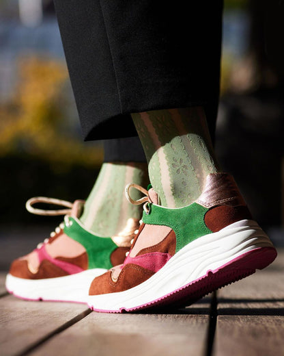 Bonnie Doon Flower Stripe Knee-Highs - Sage green fashion knee-high socks with a vertical stripe pattern with a flower and dot design worn with colourful trainers and cropped black pants.