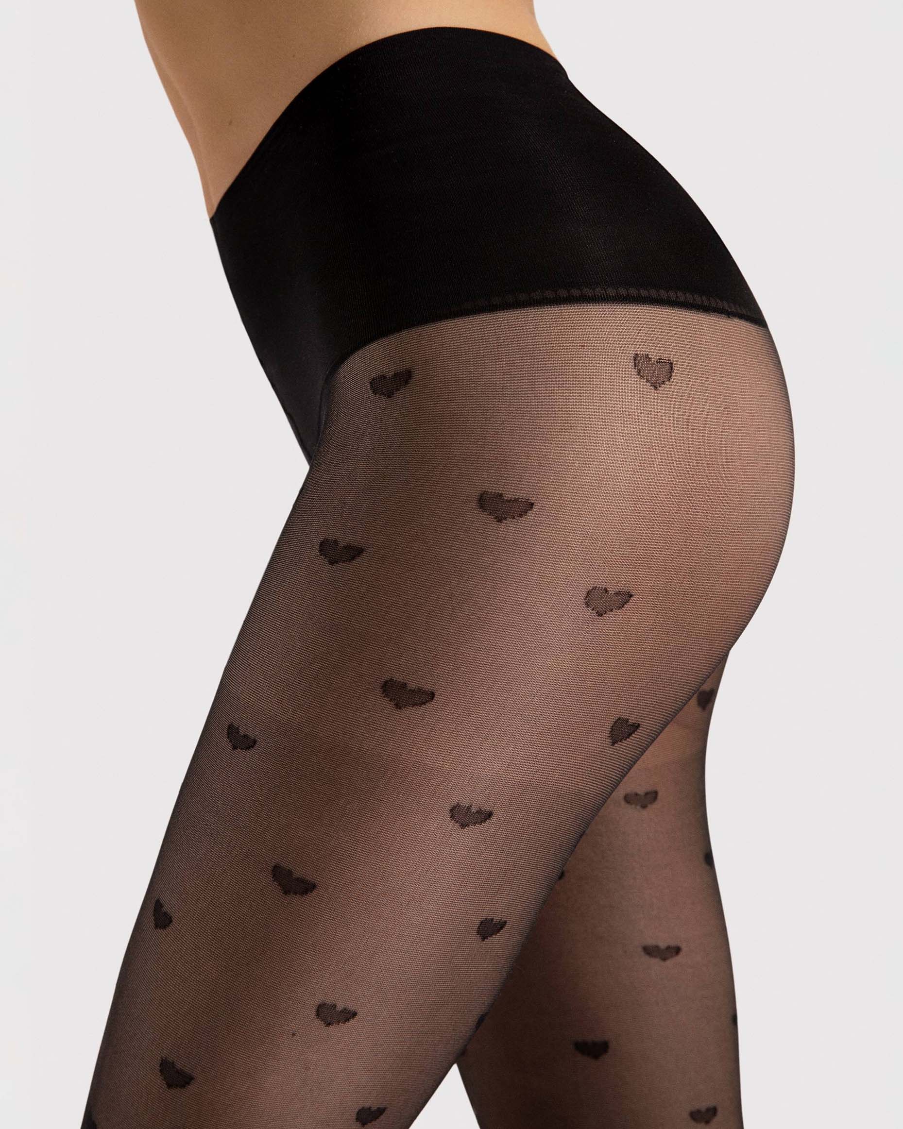 Fiore Heartbeat 20 Den - Sheer black fashion pantyhose with an all over heart pattern and deep high waisted shaping waste band.