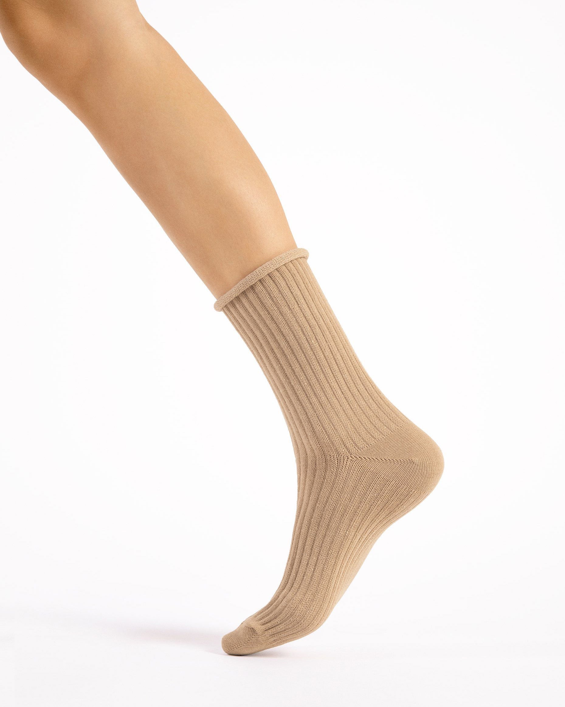 Fiore Trinny Socks - Chunky deep ribbed beige socks with sparkly gold lurex throughout and no cuff, roll top edge. Side view.