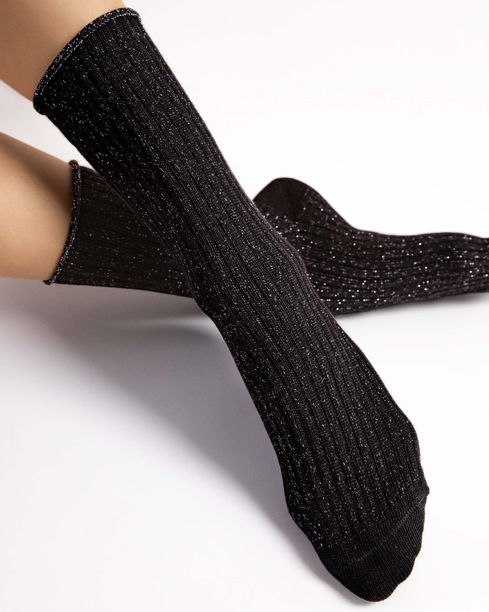 Fiore Trinny Socks - Chunky deep ribbed black socks with sparkly silver lurex throughout and no cuff, roll top edge. 