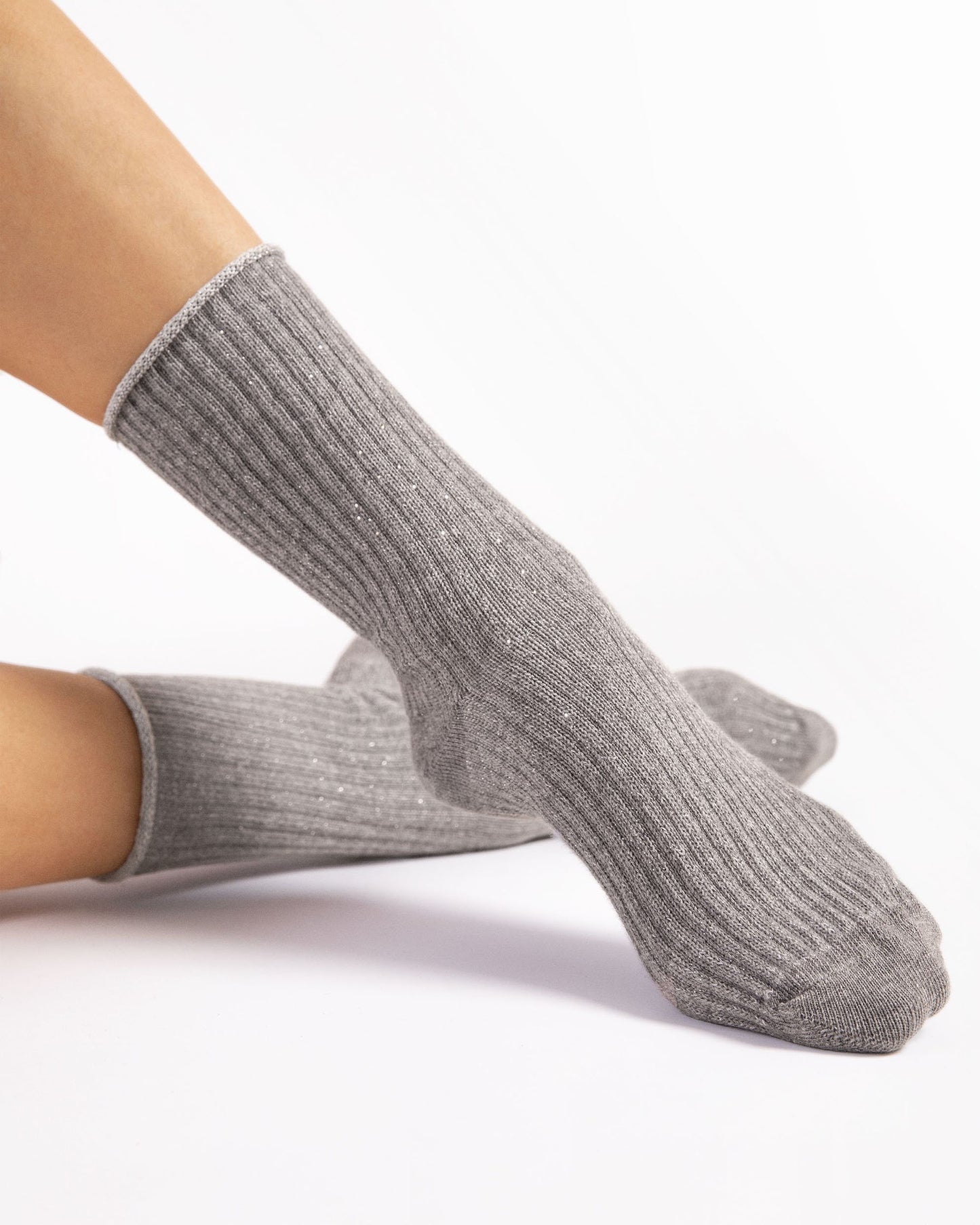 Fiore Trinny Socks - Chunky deep ribbed light grey socks with sparkly silver lurex throughout and no cuff, roll top edge. Worn with black patent crocodile loafers.