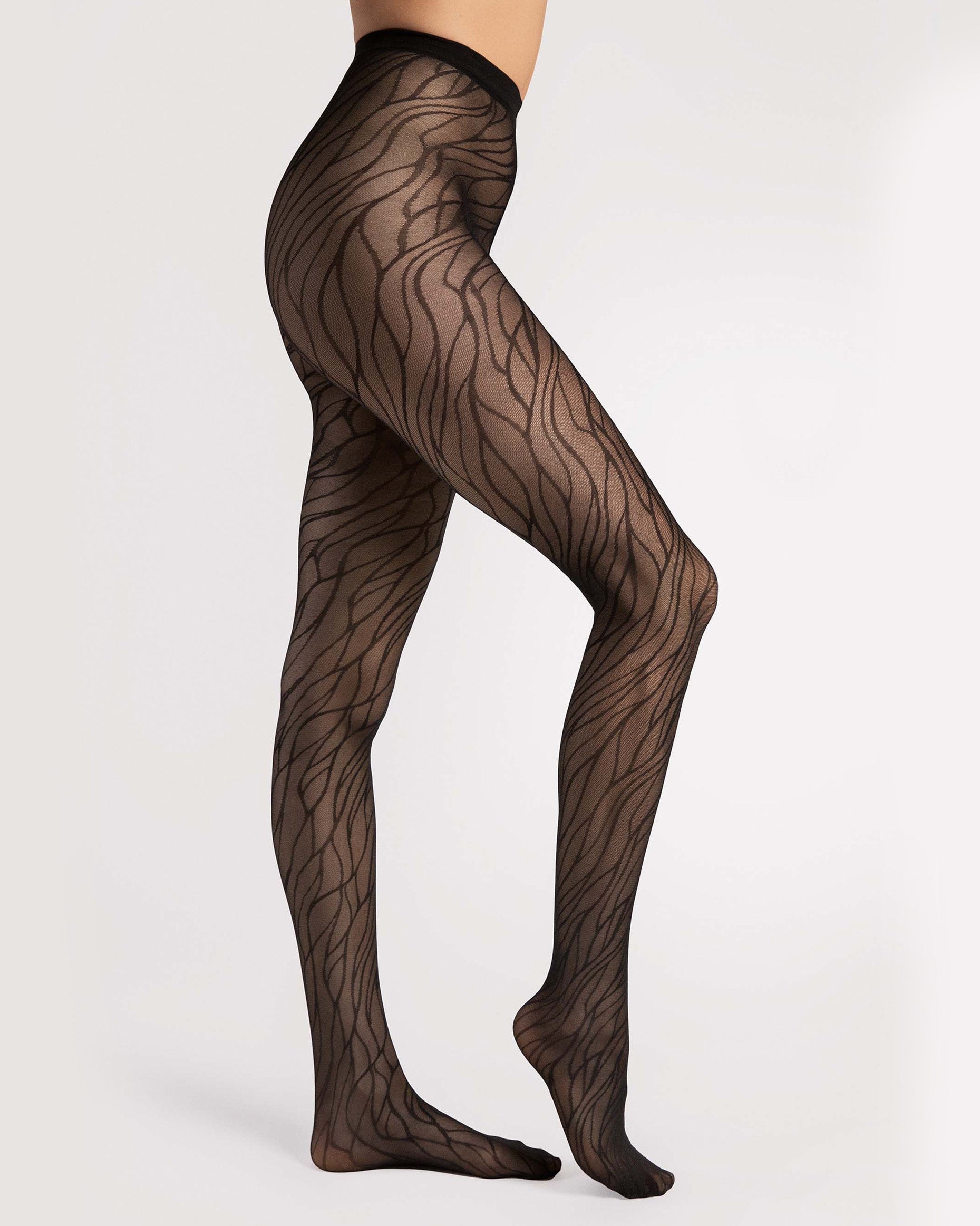 Fiore Organica 40 Den Tights - Sheer black micro mesh fashion pantyhose with a linear leaf style pattern. Side view.