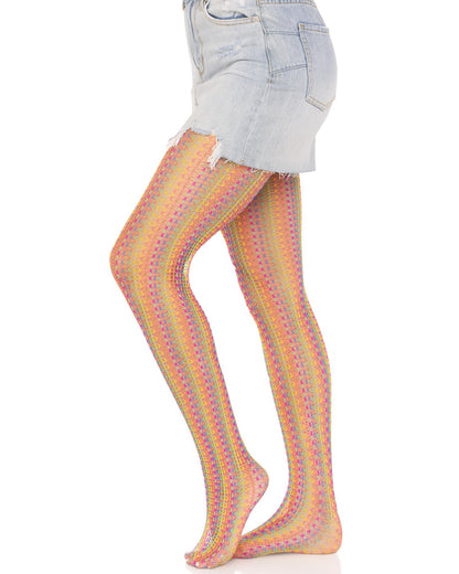 Leg Avenue 9732 Rainbow Crochet Net Tights - Openwork fashion tights with multicoloured vertical crochet style stripes. Side view. Worn with light denim mini skirt.