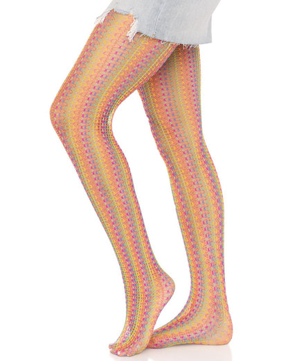 Leg Avenue 9732 Rainbow Crochet Net Tights - Openwork fashion tights with multicoloured vertical crochet style stripes. Side view. Worn with light denim mini skirt.