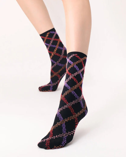 Oroblù Fur Tartan Sock - Black opaque fashion ankle socks with a textured diamond tartan style pattern in purple, pale pink, bright red and gold with a plain thin elasticated cuff. 