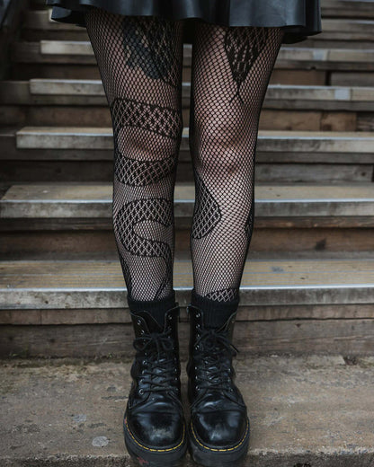 Pamela Mann Snake Net Tights - Black openwork fishnet tights with an all over snake design, worn with a leather skater skirt and doc martin boots.