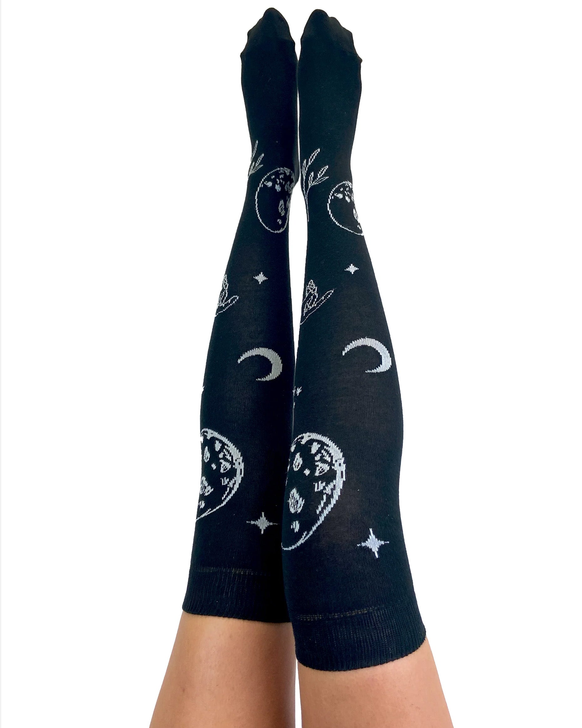 Pamela Mann Astrology Over-Knee Socks - Black cotton otk socks with an all over astrology themed pattern of moons, stars, planets and pointing hands in off white with a deep elasticated cuff.