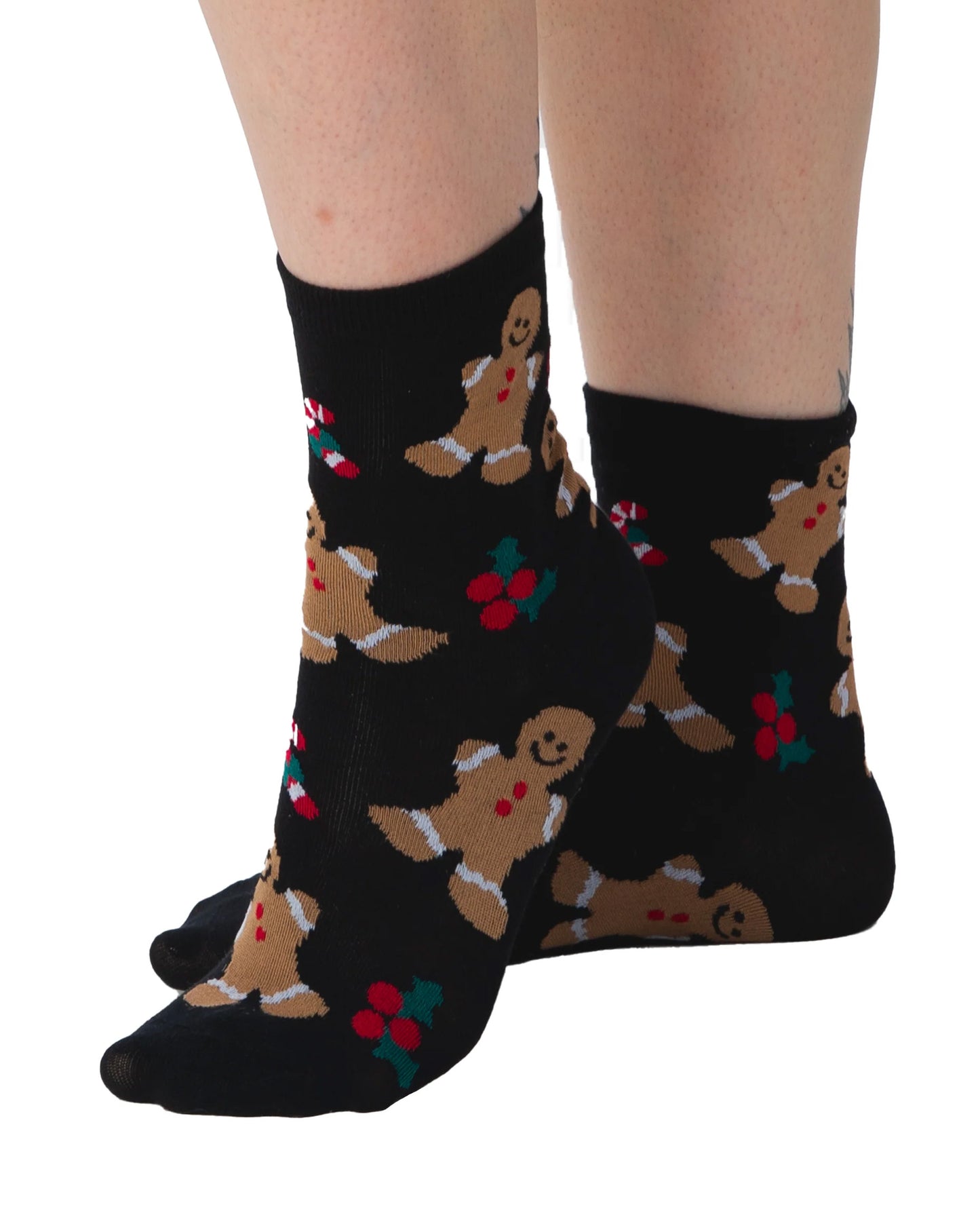 Pamela Mann Gingerbread Socks - Black cotton mix ankle socks with a Christmas themed pattern of gingerbread men and holly.