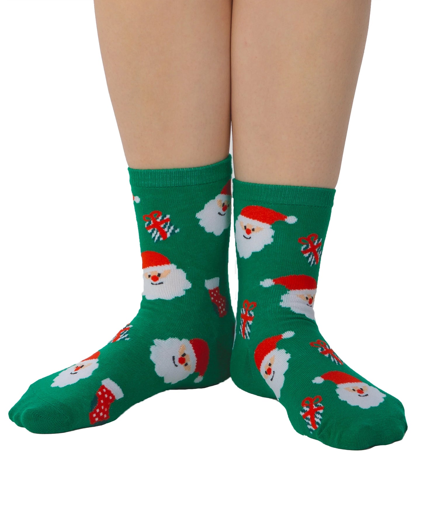 Pamela Mann Santa Socks - Green cotton mix ankle socks with a pattern of Santas, Christmas stockings and presents in red and white.