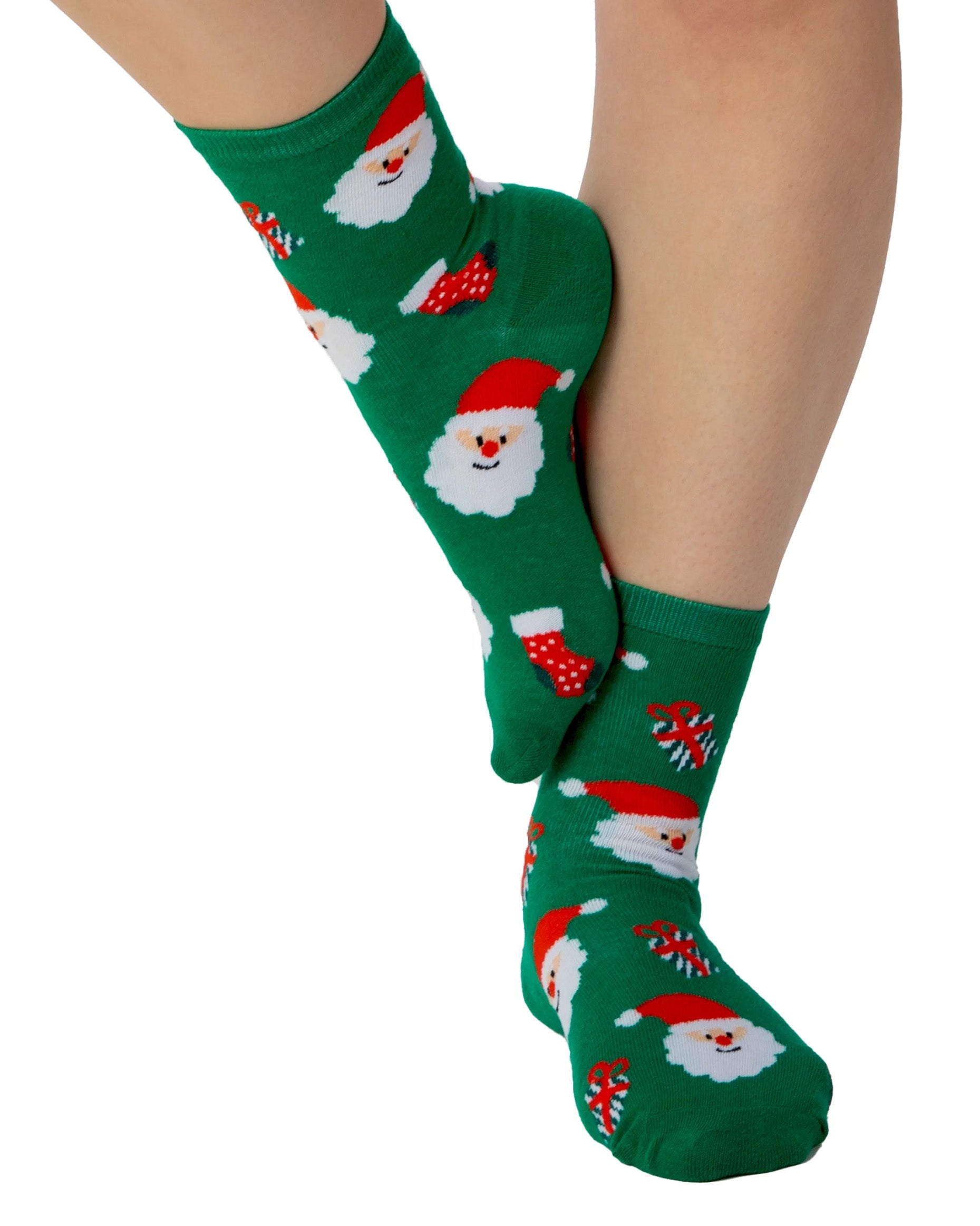 Pamela Mann Santa Socks - Green cotton mix ankle socks with a pattern of Santas, Christmas stockings and presents in red and white.