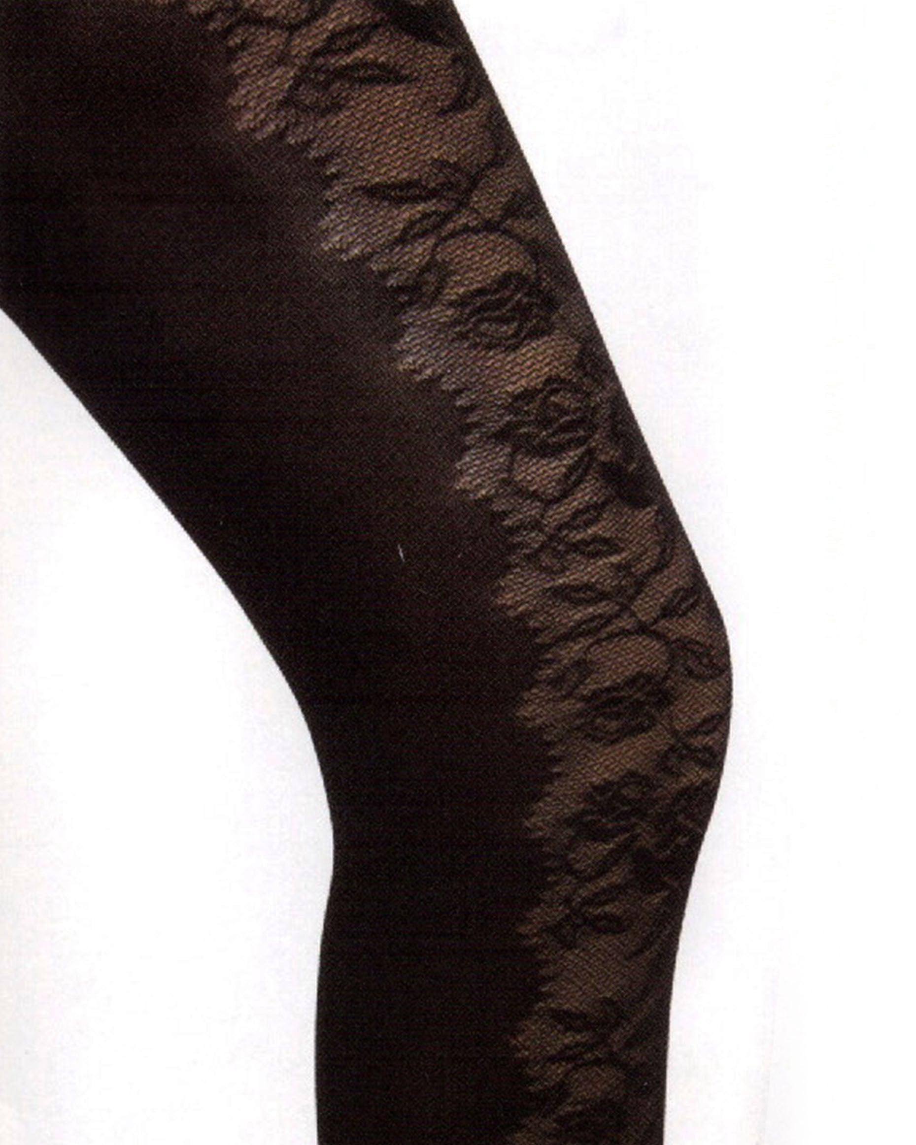 Silvia Grandi Elisium Collant - Black fashion tights with a floral lace style pattern to the front and plain opaque to the back. Side view, close up.