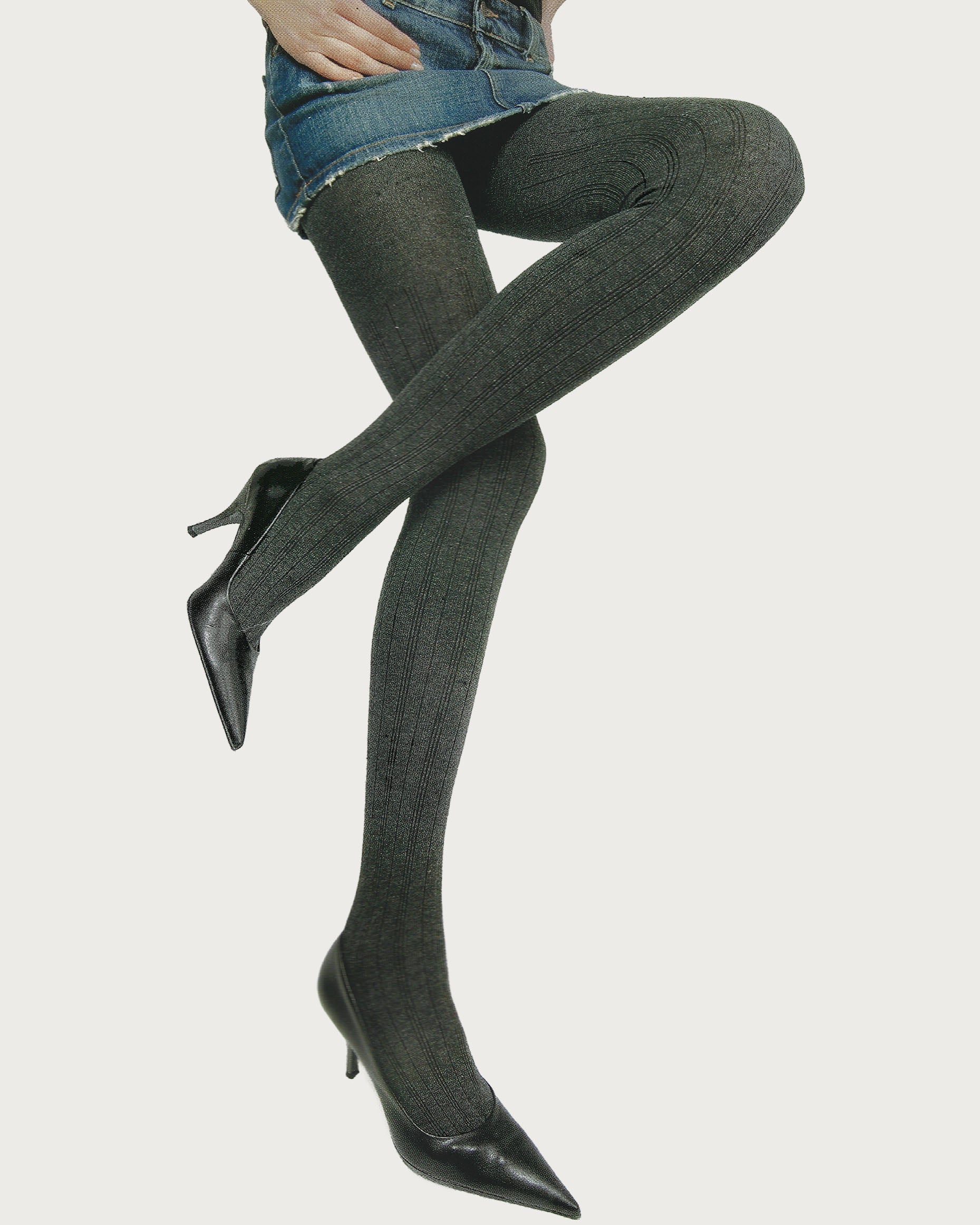 Osé Siberia Collant - dark grey wool and cotton knitted warm thermal tights, worn with a mini denim skirt.