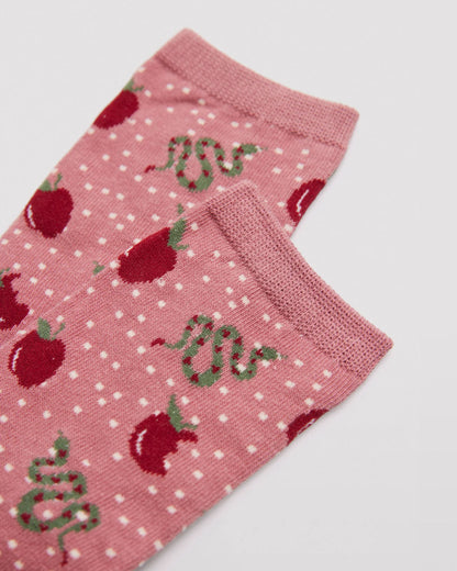 Ysabel Mora 12205 Snakes & Apples Sock - Pale dirty pink crew length cotton ankle socks with an all over pattern of red apples, green & red striped snakes on a white spotty background, plain elasticated cuff detail.