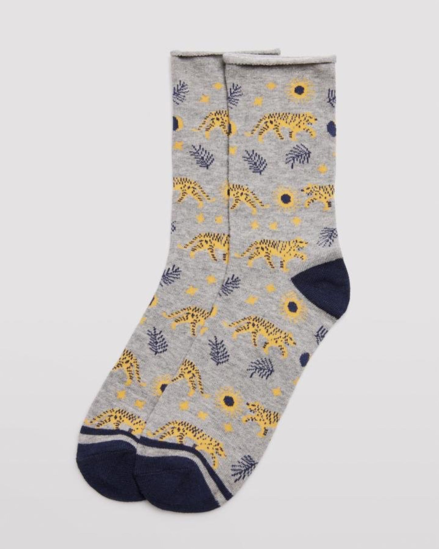 Ysabel Mora 12212 Cheetah Socks - Light grey crew length cotton ankle socks with an all over pattern of cheetah cats, branches, sunflowers and stars with a soft roll top edge, navy flat toe seam and shaped heel.