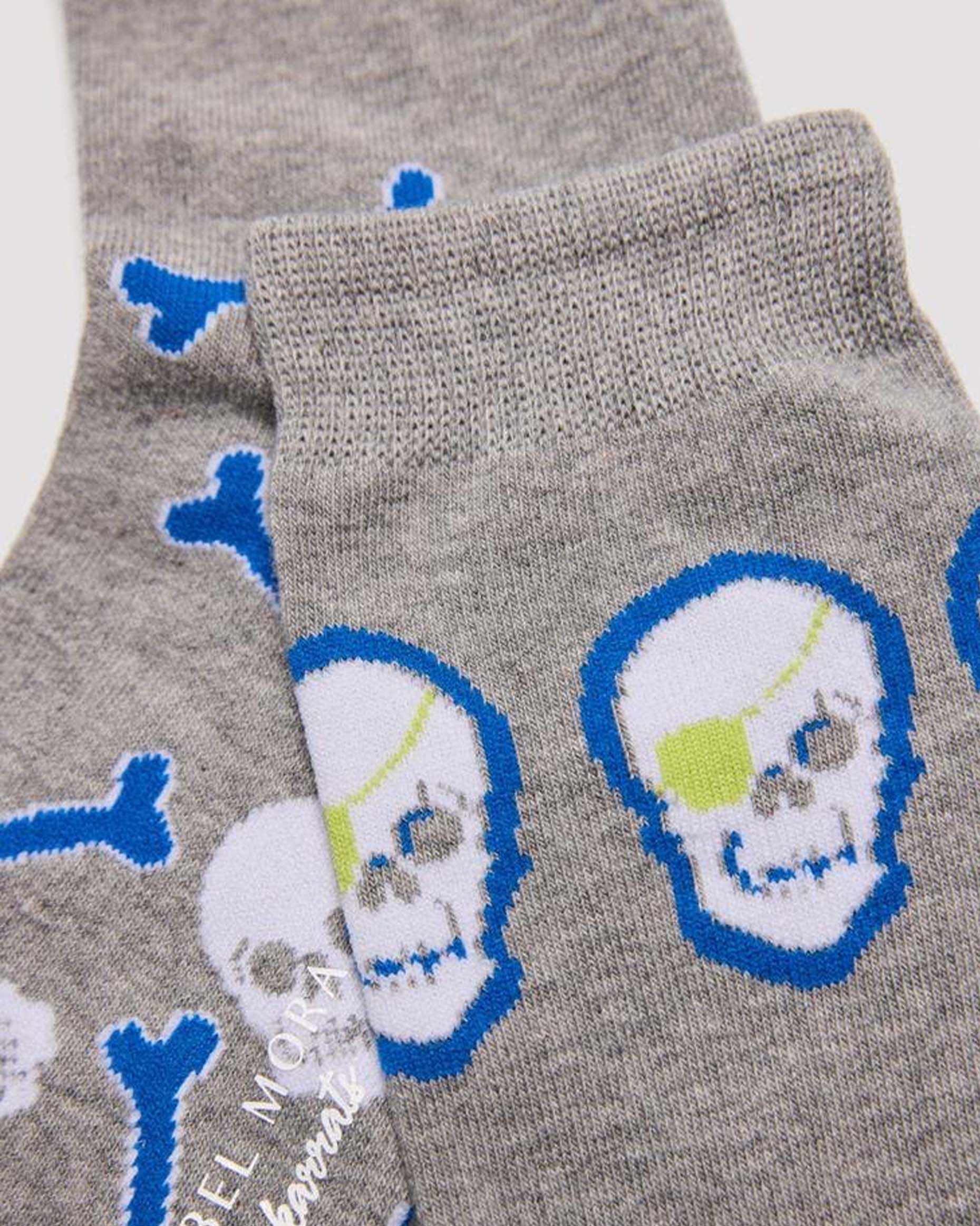 Ysabel Mora 22177 Skull & Bones Socks - Light grey crew length cotton ankle socks with pirate themed skulls and bones pattern in white, blue and lime green and deep comfort cuff.