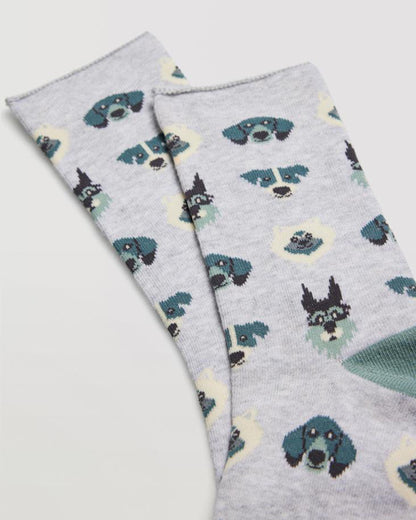 Light grey cotton ankle sock with an assorted dog face pattern in sage green and cream, contrast heel and toe and no cuff edge roll.