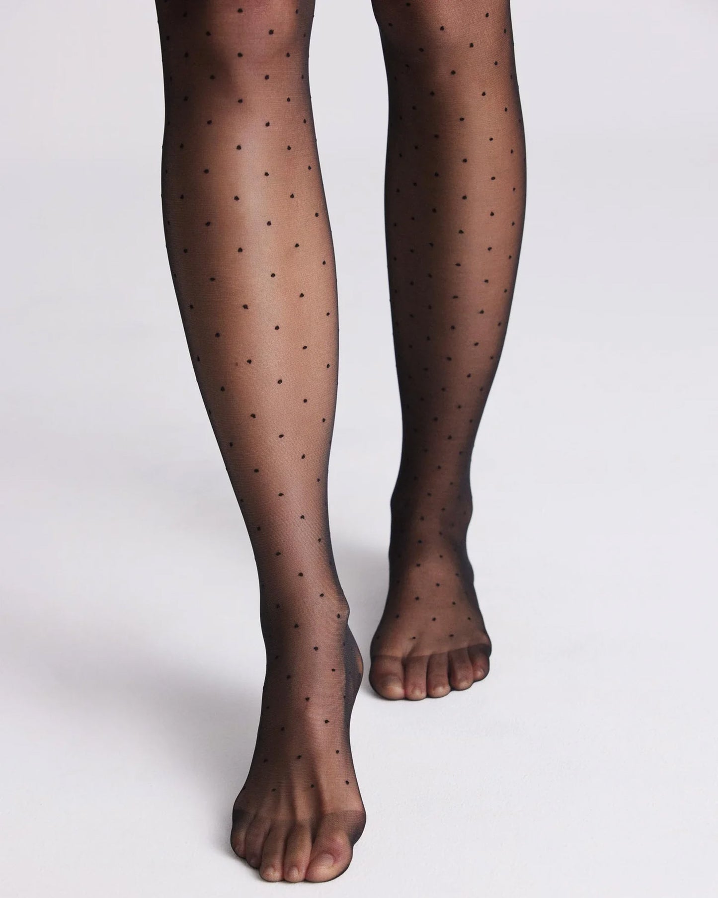 Ysabel Mora 16419 Sheer black polka dot spot patterned tights. Reinforced toe detail.