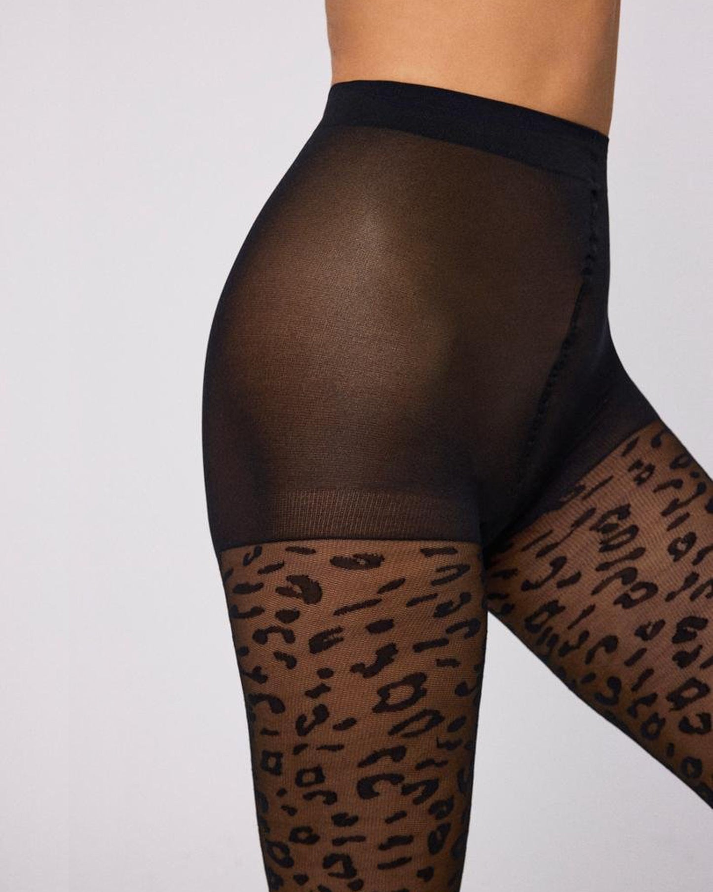 Ysabel Mora 16613 Leopard Print Tights - Sheer black micro mesh fashion tights with a woven black leopard style pattern, flat seams and reinforced boxer top.