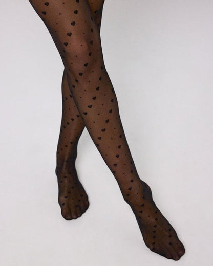 Ysabel Mora 16614 Heart & Spots Tights - Sheer black fashion tights with a diagonal pattern of hearts and spots.