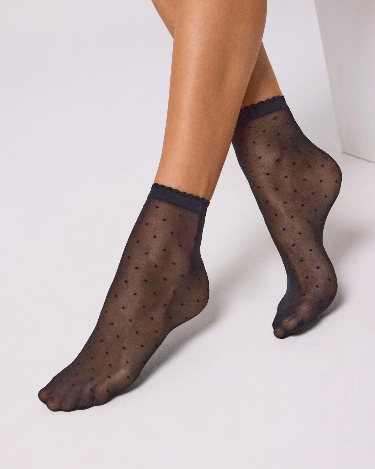 Ysabel Mora 16618 Polka Dot Sock - Sheer black fashion ankle socks with a woven leopard print pattern and scalloped cuff.