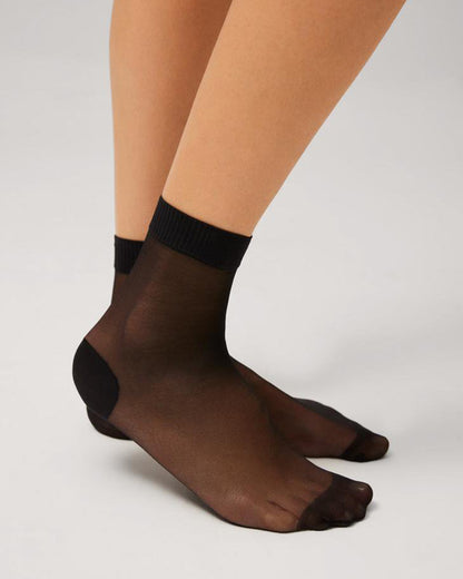 Ysabel Mora 18114 Sheer Reinforced Ankle Socks - Sheer black ankle sock with an opaque reinforced toe and heel and soft ribbed anti-pressure comfort cuff.