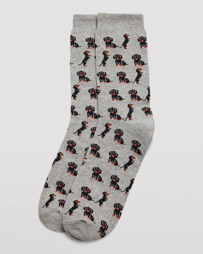 Ysabel Mora Dachshund Sock - Men's light grey cotton crew length ankle socks with an all over pattern of cute black and brown dachshunds (a.k.a sausage dogs) with soft anti-pressure cuffs.