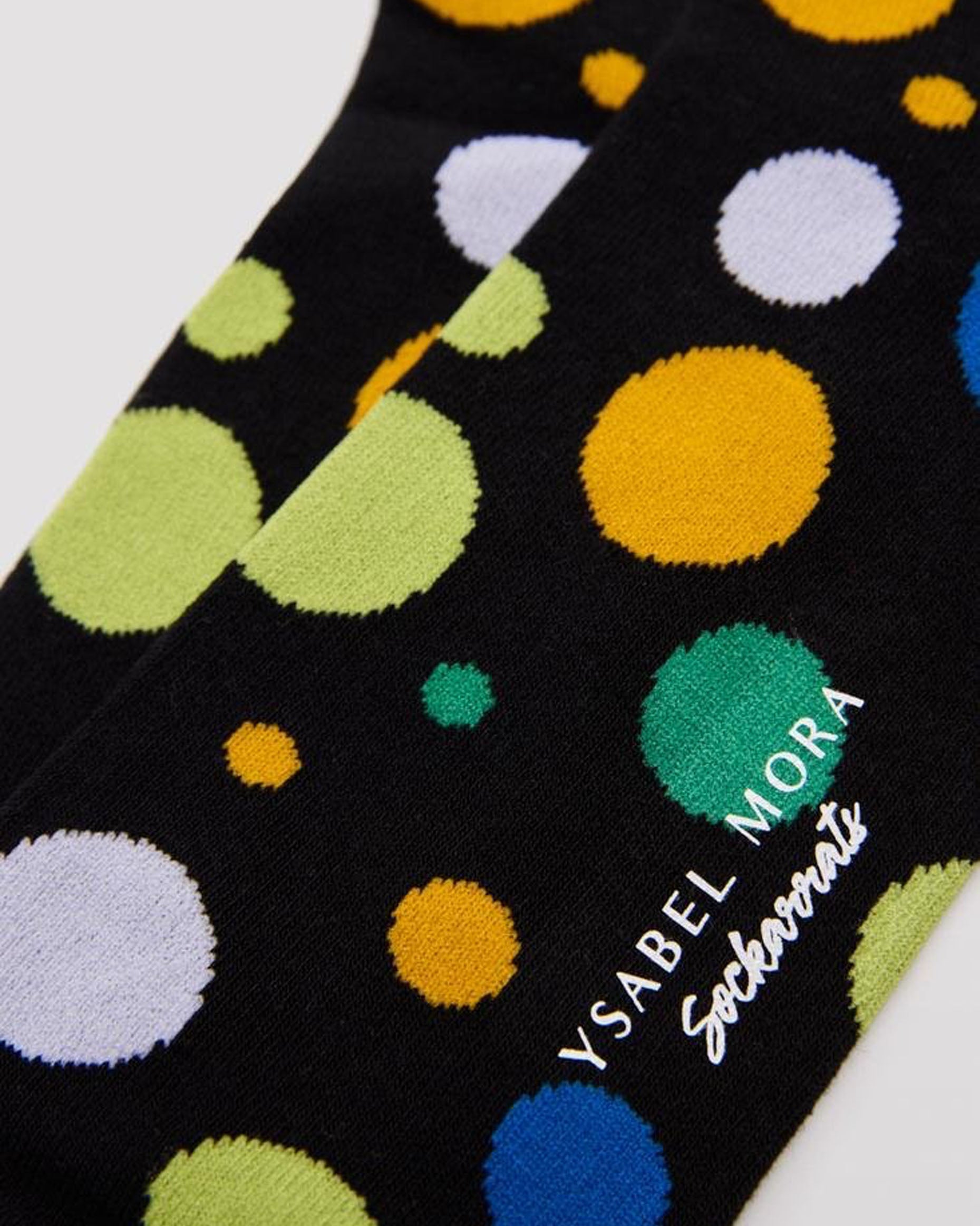 Ysabel Mora 22168 Spotty Socks - Men's black crew length cotton ankle socks with an all over polka dot pattern, close up detail.