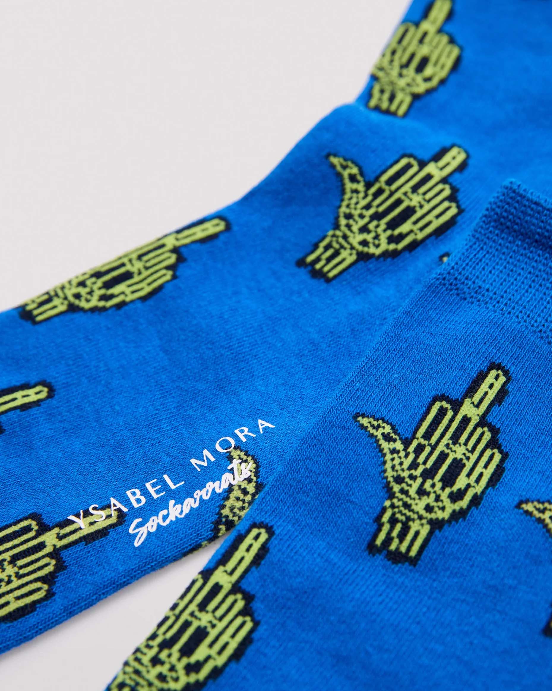 Ysabel Mora 22177 Skeleton Hands Socks - Blue crew length cotton ankle socks with an all over pattern of skeleton hands giving the middle finger in lime green and navy and deep comfort cuff.