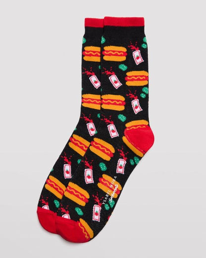 Ysabel Mora 22179 Hot Dog Sock - Men's black cotton crew length ankle socks with an all over pattern of hot dogs with mustard sauce, packets of tomato ketchup and jerkins, red toe and heel and soft anti-pressure cuff with a red stripe on edge.