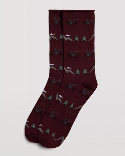 Ysabel Mora 22877 Mountain Bike Sock - Wine cotton mix crew length ankle socks with a mountain bike themed pattern of mountains, trees and bicycles in shades of green, grey and black and a no cuff roll top.