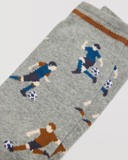 Ysabel Mora 22883 Football Socks - Light grey cotton socks with a warm thick terry lining, football players pattern in shades of blue and rust and a rust stripe on the cuff.