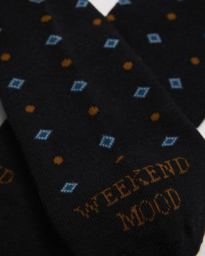 Ysabel Mora 22883 Weekend Mood Socks - Thick and warm black terry lined cotton mix crew length ankle socks with a spot and diamond pattern in rust and blue with the text "weekend mood" on the toe