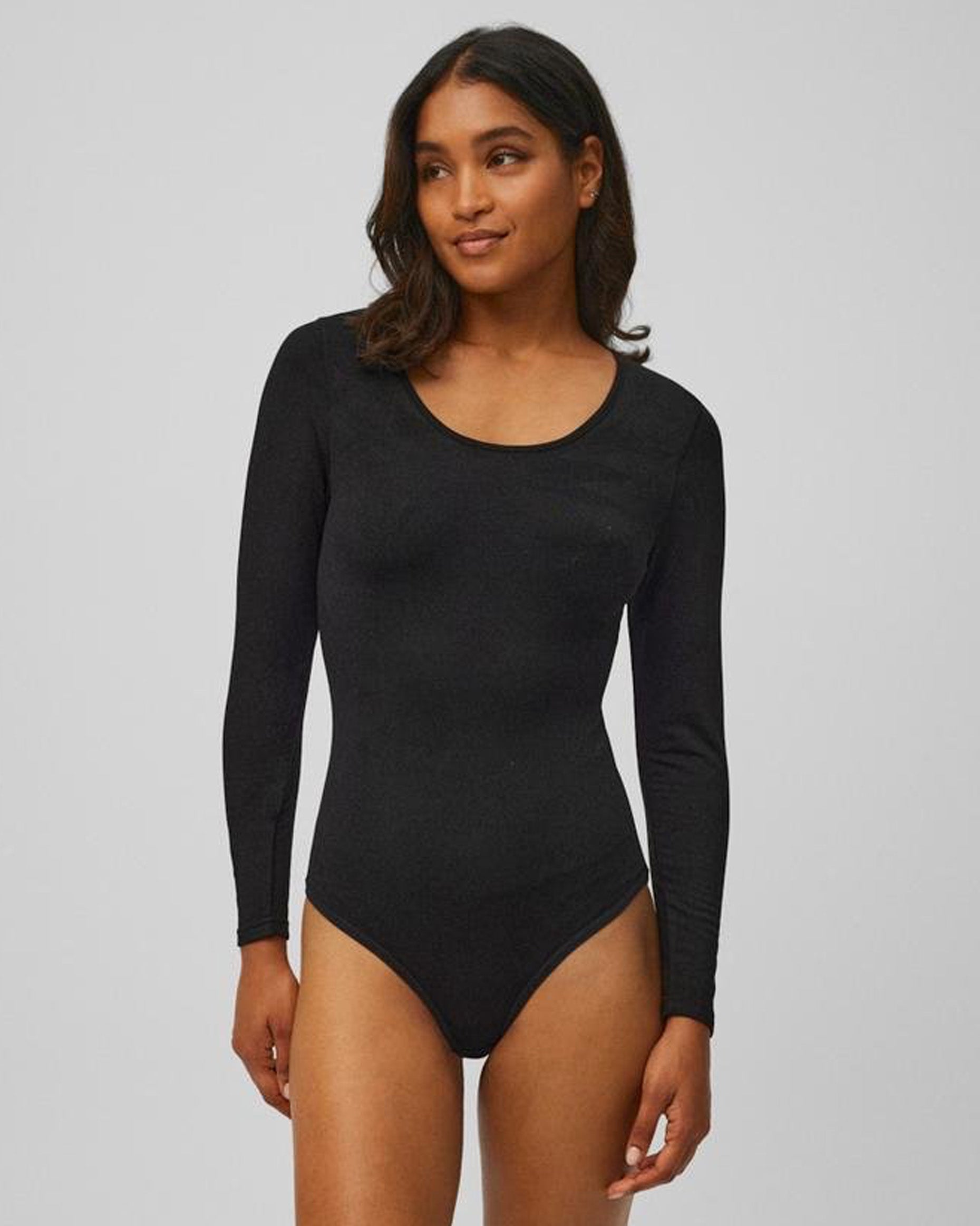 Ysabel Mora 70016 Thermal Body-Top - Soft and warm black fleece lined long sleeved body-top with a round neck and hook and eye fastener closures.