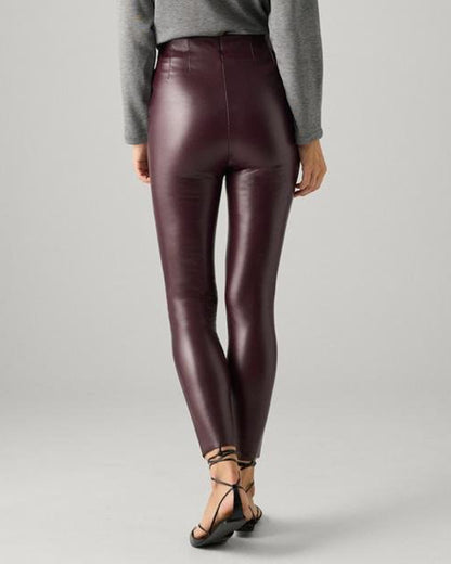 Ysabel Mora 70164 Faux Leather Leggings - High rise dark purple / aubergine faux leather fleece lined trouser leggings with invisible side zip, darts at the front and back to ensure a snug fit. Back view.