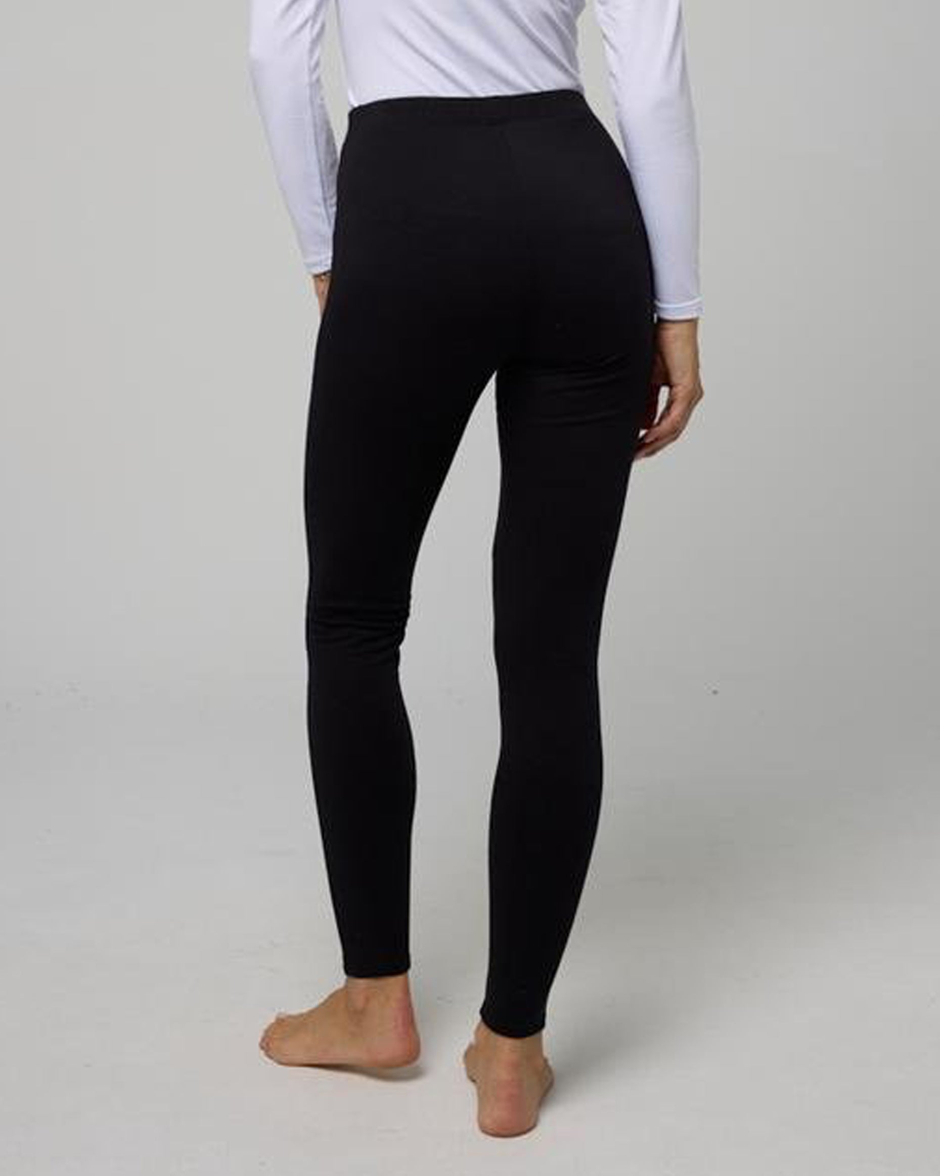 Ysabel Mora 70218 Thermal Cotton Leggings - Soft and warm black cotton leggings with a soft lining and elasticated waist band. Back view.