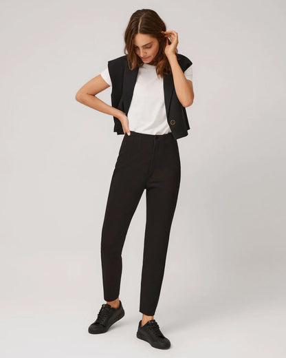 Ysabel Mora 70403 High Waist Trousers - Black suit style high waisted pants with pleated darts, invisible front zipper and button, worn with white t-shirt, waist coat and black sneakers