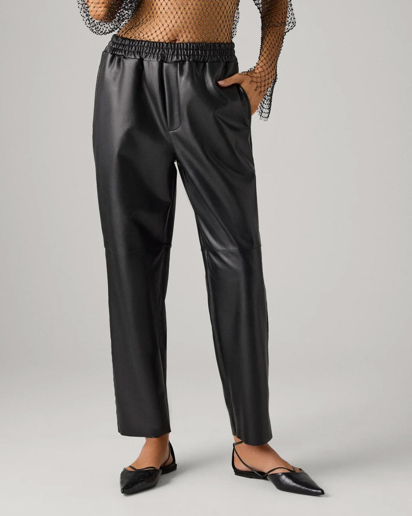 Ysabel Mora 70418 Faux Leather Pants - Loose fitting black faux leather thermal trousers with side pockets, elasticated waistband, drawstrings, taped leg and soft, warm plush fleece lining.