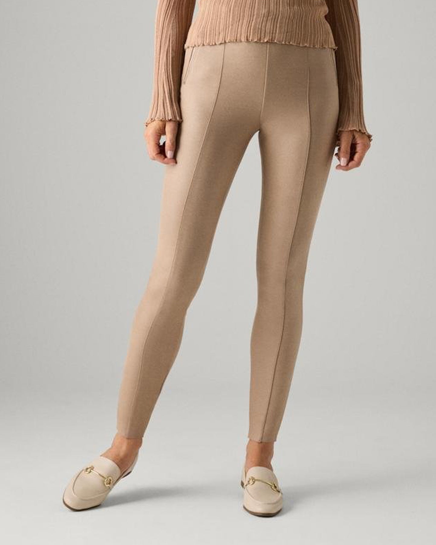 Ysabel Mora 7032 Faux Suede Leggings - Faux suede effect jodhpur style trousers leggings in a light beige shade, with silver zipped faux front pockets, front raised seam down the front of the legs, back pockets and tapered legs. 