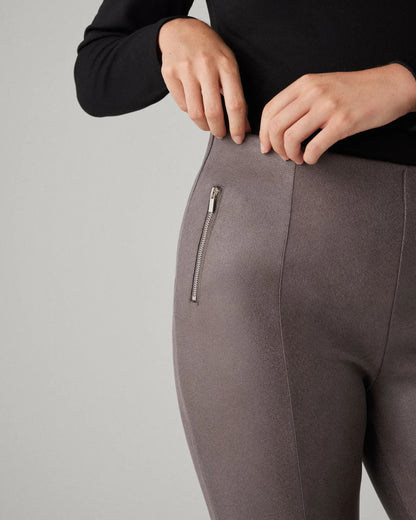 Ysabel Mora 7032 Faux Suede Leggings - Faux suede effect jodhpur style trousers leggings in a grey taupe shade, with silver zipped faux front pockets, front raised seam down the front of the legs, back pockets and taped legs. Close up detail.