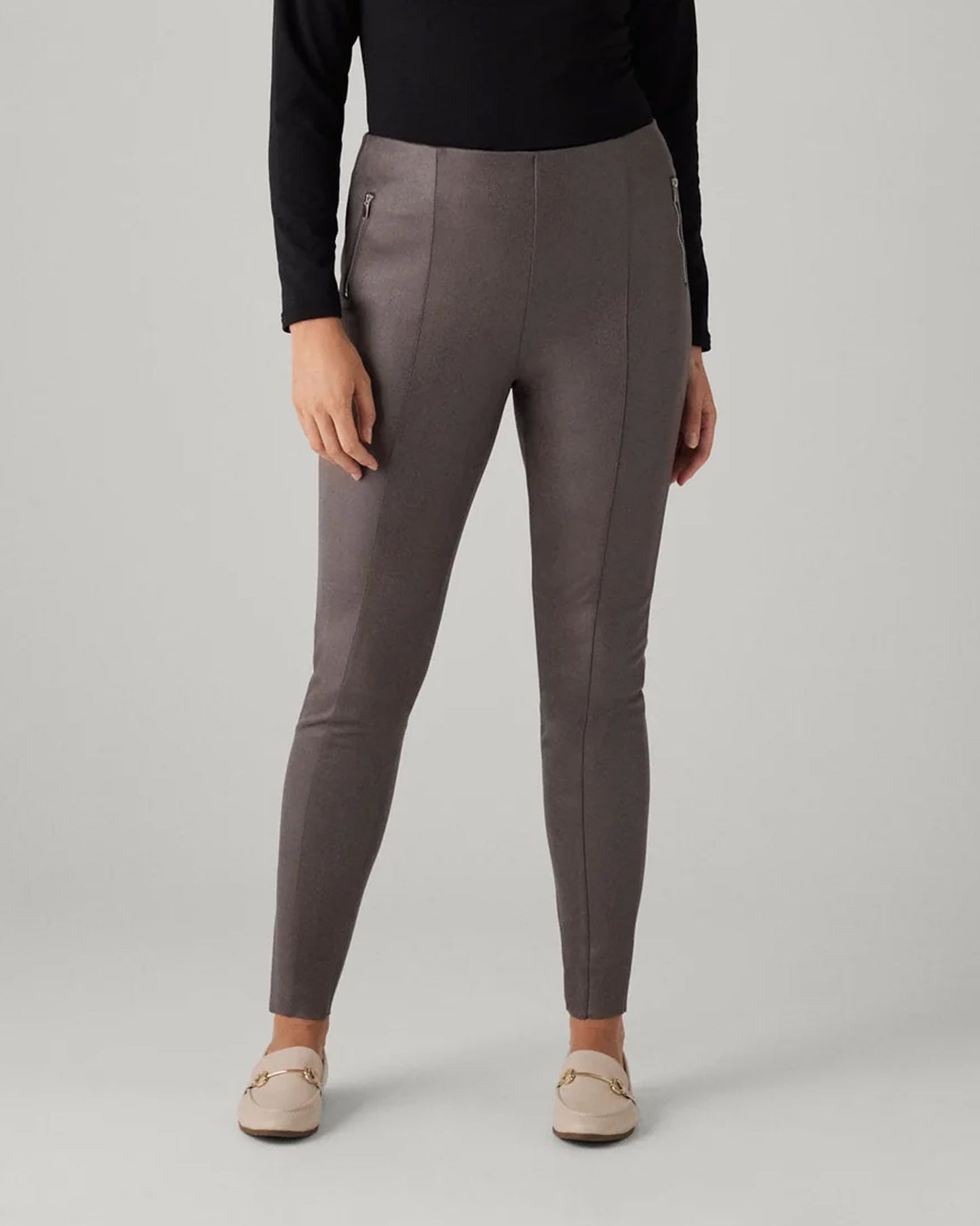 Ysabel Mora 7032 Faux Suede Leggings - Faux suede effect jodhpur style trousers leggings in a grey taupe shade, with silver zipped faux front pockets, front raised seam down the front of the legs, back pockets and taped legs.