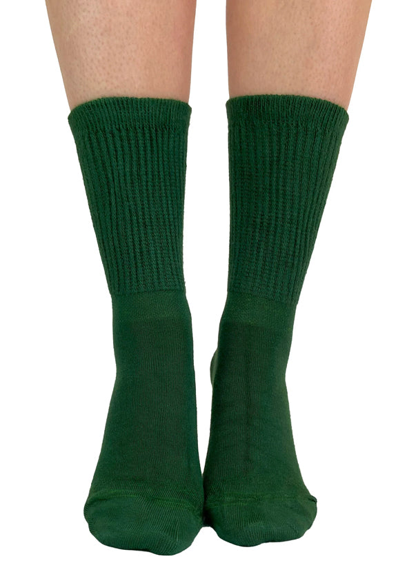 Soft and breathable dark green bamboo slouch socks with a loose knitted rib top, ankle and foot support and flat toe seams.