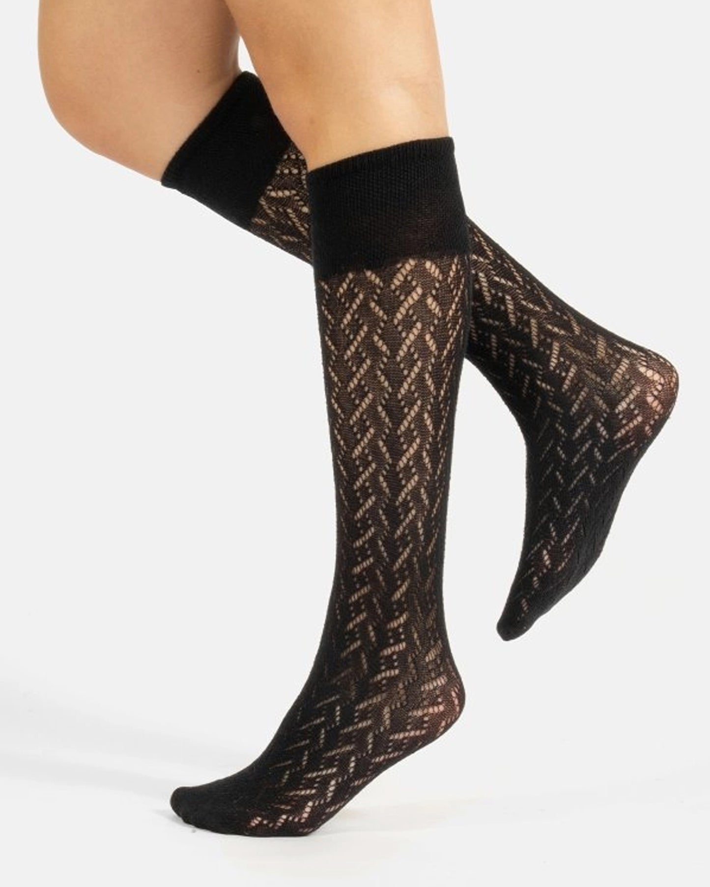 Calzitaly Chevron Knee-highs - Black knitted knee-high socks with an openwork cable style pattern, plain elasticated cuff and plain toe. Side view.