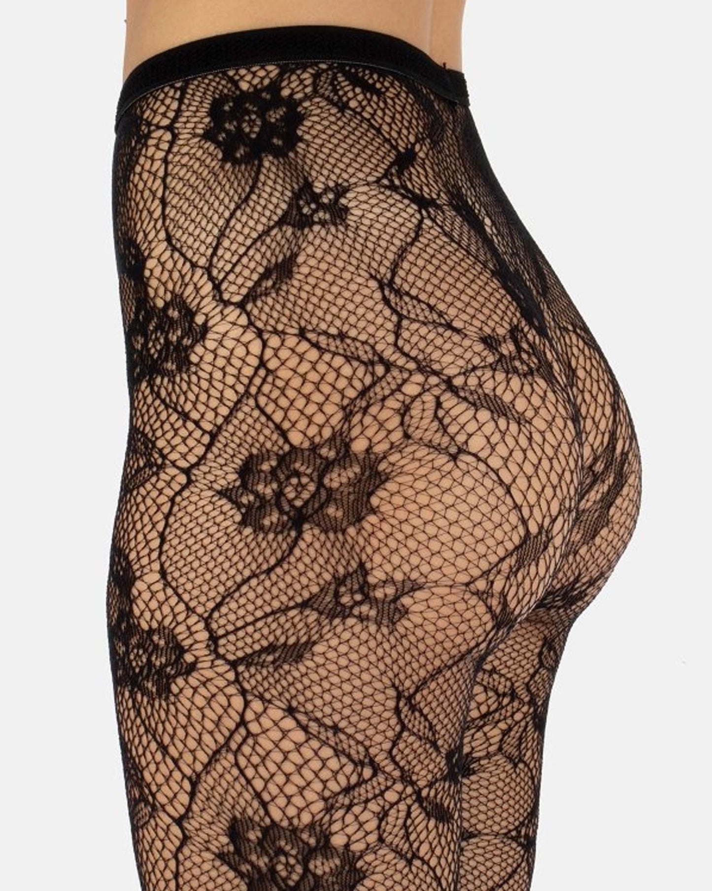 Calzitaly Fishnet Floral Lace Tights - Eco-friendly recycled nylon openwork black floral fishnet lace style seamless tights, top detail side view.