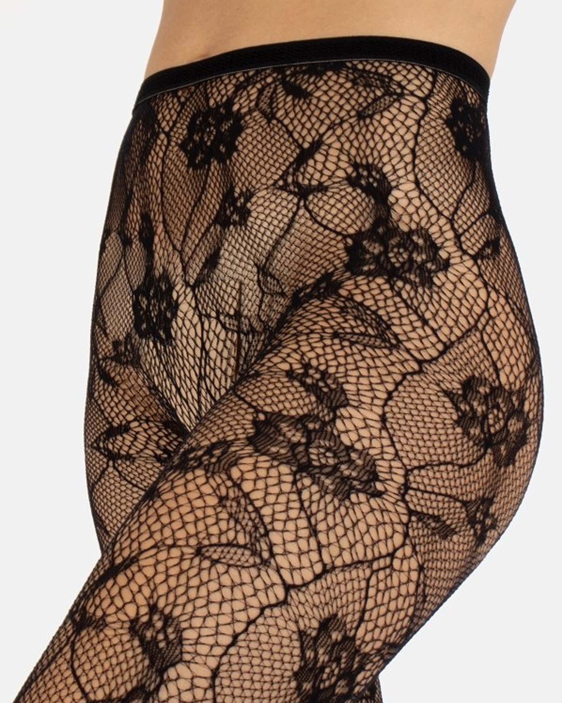 Calzitaly Fishnet Floral Lace Tights - Eco-friendly recycled nylon openwork black floral fishnet lace style seamless tights, top detail.