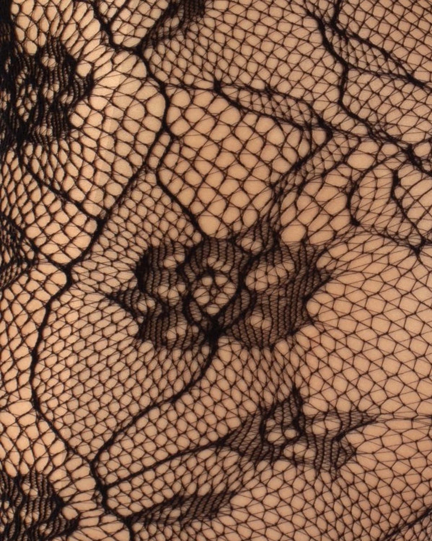 Calzitaly Fishnet Floral Lace Tights - Eco-friendly recycled nylon openwork black floral fishnet lace close up detail.