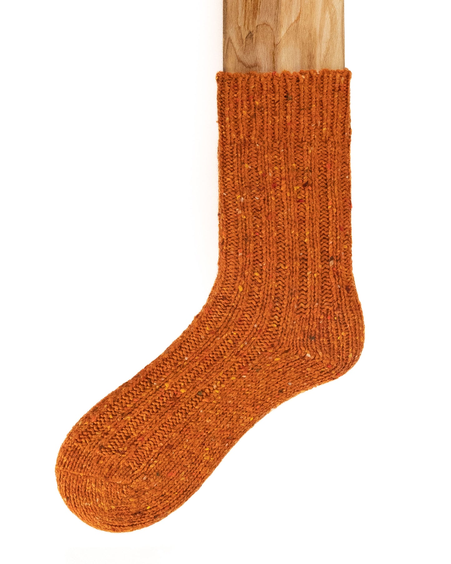 Chunky rust orange coloured ribbed knitted wool mix ankle socks with plain sole and a fleck throughout. Made in Ireland by Connemara Socks.