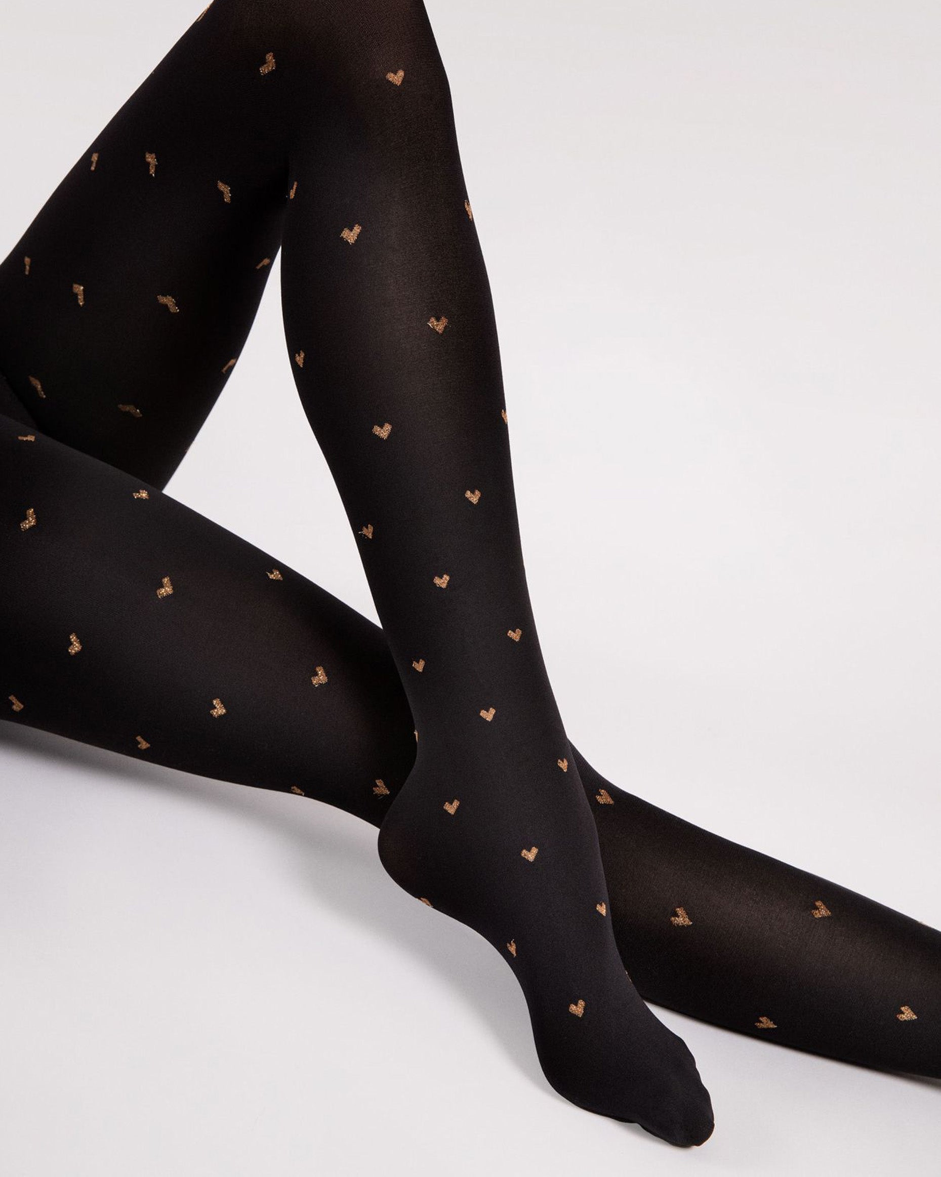 Fiore Copper Love Tights - Black opaque fashion tights with an all over taupe and sparkly bronze lurex heart pattern.