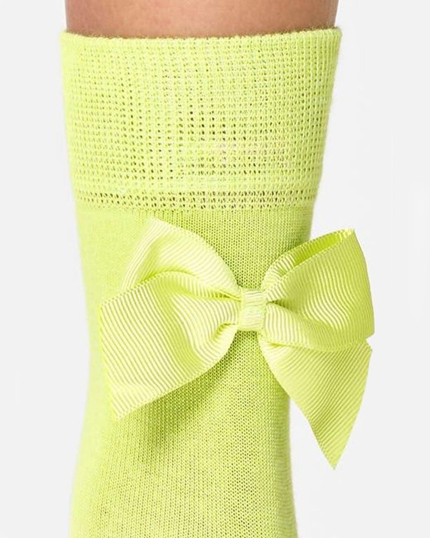 Happy Socks Bow Sock - Bright lime green quarter high (1/2 crew) cotton socks with same colour satin bows on the back, deep cuff, shaped heel and flat toe seam. Back view detail.