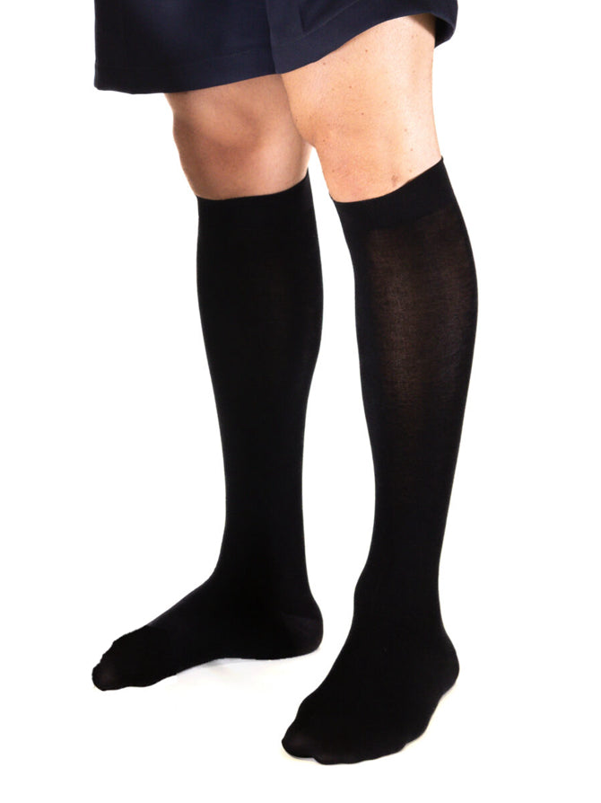 Ibici Active Sock - Men's black business & travel knee-high socks with medium graduated compression, in ecological Tencel yarn of cellulosic origin. Soft on the skin, breathable, light and comfortable with antibacterial effect on the skin, anatomical heel, soft and comfortable elastic edge.