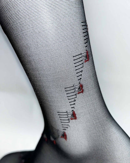 Omsa Basic Gambaletto - Sheer black fashion knee-high / pop-socks with a woven diagonal geometric pattern made up of squares and triangles in red and white.